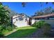 Private backyard patio with lush landscaping and room for grilling at 2915 Oak Ln, Bradenton, FL 34209