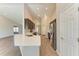 Modern kitchen with dark brown cabinets, stainless steel appliances, and a quartz countertop at 3030 58Th E Way, Palmetto, FL 34221