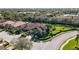 Aerial view of house and neighborhood at 3706 80Th E Dr, Sarasota, FL 34243