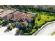 Aerial view of house and neighborhood at 3706 80Th E Dr, Sarasota, FL 34243