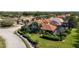 Home with pool and lush landscaping in a community at 3706 80Th E Dr, Sarasota, FL 34243