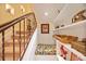 Finished basement with built-in shelves, pet bed, and staircase at 3706 80Th E Dr, Sarasota, FL 34243