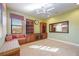 Comfortable bedroom with built-in window seat and bookcases at 3706 80Th E Dr, Sarasota, FL 34243