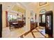 Elegant dining room with hardwood floors and a chandelier at 3706 80Th E Dr, Sarasota, FL 34243