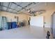 Spacious garage with storage cabinets and room for bikes at 3706 80Th E Dr, Sarasota, FL 34243