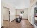 Clean grooming area with tile floors, counter, and a small sink at 3825 Sarasota Golf Club Blvd, Sarasota, FL 34240