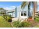 Backyard of a light blue condo with patio at 3856 Trophy Blvd # 2, New Port Richey, FL 34655
