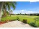 Spacious backyard with golf course view and patio at 3856 Trophy Blvd # 2, New Port Richey, FL 34655