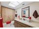 Clean bathroom with a shower/tub combo, vanity, and mirror at 3856 Trophy Blvd # 2, New Port Richey, FL 34655