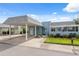 Attractive light blue condo with carport and landscaping at 3856 Trophy Blvd # 2, New Port Richey, FL 34655