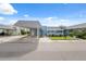 Condo exterior showcasing the carport and landscaping at 3856 Trophy Blvd # 2, New Port Richey, FL 34655