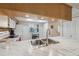 Clean kitchen with marble countertops and stainless steel sink at 3856 Trophy Blvd # 2, New Port Richey, FL 34655
