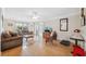 Living room with hardwood floors and comfy seating at 3856 Trophy Blvd, New Port Richey, FL 34655