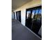 Private balcony with sliding glass doors, overlooking a tranquil view at 4119 61St Avenue W Ter # 308, Bradenton, FL 34210