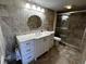 Bathroom with granite countertop, white vanity, and tile flooring at 4119 61St Avenue W Ter # 308, Bradenton, FL 34210