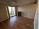Bright bedroom with laminate flooring and sliding glass door to balcony at 4119 61St Avenue W Ter # 308, Bradenton, FL 34210