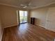 Bright bedroom with laminate flooring and sliding glass door to balcony at 4119 61St Avenue W Ter # 308, Bradenton, FL 34210