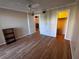 Bright bedroom with laminate flooring and sliding glass door to balcony at 4119 61St Avenue W Ter # 308, Bradenton, FL 34210