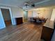 Bright dining room with hardwood floors, dining table, and chandelier at 4119 61St Avenue W Ter # 308, Bradenton, FL 34210