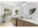 Spa-like bathroom with double vanity and large mirrors at 4316 Callista Ln, Sarasota, FL 34243