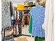 Walk-in closet with ample hanging space, shelving, and drawer storage for organization at 4316 Callista Ln, Sarasota, FL 34243