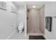 Clean bathroom with walk-in shower and toilet at 4662 Long Lake Dr, Sarasota, FL 34233