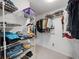 Large walk-in closet with ample shelving and hanging space at 4662 Long Lake Dr, Sarasota, FL 34233