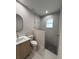 Modern bathroom with walk-in shower and stylish vanity at 5274 Neon Ave, North Port, FL 34291