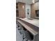 Modern kitchen island with seating for four, features a large countertop at 5274 Neon Ave, North Port, FL 34291