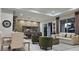 Open concept kitchen and living room with modern design at 5274 Neon Ave, North Port, FL 34291