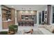 Open-concept living space featuring a modern kitchen, a seating area and sliding glass doors to a patio at 5274 Neon Ave, North Port, FL 34291