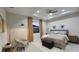 Spacious main bedroom with a king bed and plenty of natural light at 5274 Neon Ave, North Port, FL 34291