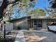 Mid-century modern home with a unique architectural design and a spacious yard at 5453 Avenida Del Mare, Sarasota, FL 34242