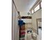 Large storage room with cabinets and shelving at 5453 Avenida Del Mare, Sarasota, FL 34242