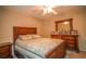 Charming bedroom with a double bed and wooden dresser at 5715 Fern Oak Ct, Sarasota, FL 34232