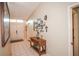 Bright entryway with tile flooring and decorative wall art at 5715 Fern Oak Ct, Sarasota, FL 34232