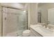 Modern bathroom with a large shower and quartz vanity at 6043 Bluestar Ct, Bradenton, FL 34211