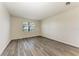Empty bedroom with wood-look floors, ready for your furniture at 6043 Bluestar Ct, Bradenton, FL 34211