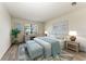 Spacious bedroom with light walls and wood-look flooring at 6043 Bluestar Ct, Bradenton, FL 34211