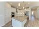 Modern kitchen with granite countertops and stainless steel appliances at 6043 Bluestar Ct, Bradenton, FL 34211