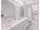 Clean bathroom with double vanity and large mirrors at 608 69Th W Ave, Bradenton, FL 34207