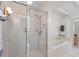 Updated bathroom with walk-in shower and bathtub at 608 69Th W Ave, Bradenton, FL 34207
