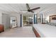 Spacious bedroom with backyard access and ceiling fan at 608 69Th W Ave, Bradenton, FL 34207