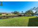 Peaceful canal view from the backyard, providing a serene setting at 608 69Th W Ave, Bradenton, FL 34207