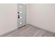 Interior entryway with gray walls and wood-look flooring at 608 69Th W Ave, Bradenton, FL 34207