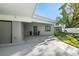 Stylish entryway with a modern door and paved walkway at 608 69Th W Ave, Bradenton, FL 34207