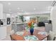 Open kitchen and dining area with modern finishes at 608 69Th W Ave, Bradenton, FL 34207