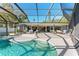 Spacious pool and spa with screened patio overlooking the canal at 608 69Th W Ave, Bradenton, FL 34207