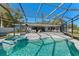 Relax by the refreshing pool and spa, under a screened cage at 608 69Th W Ave, Bradenton, FL 34207
