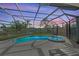 Enjoy this tranquil pool and spa with a covered patio at 608 69Th W Ave, Bradenton, FL 34207